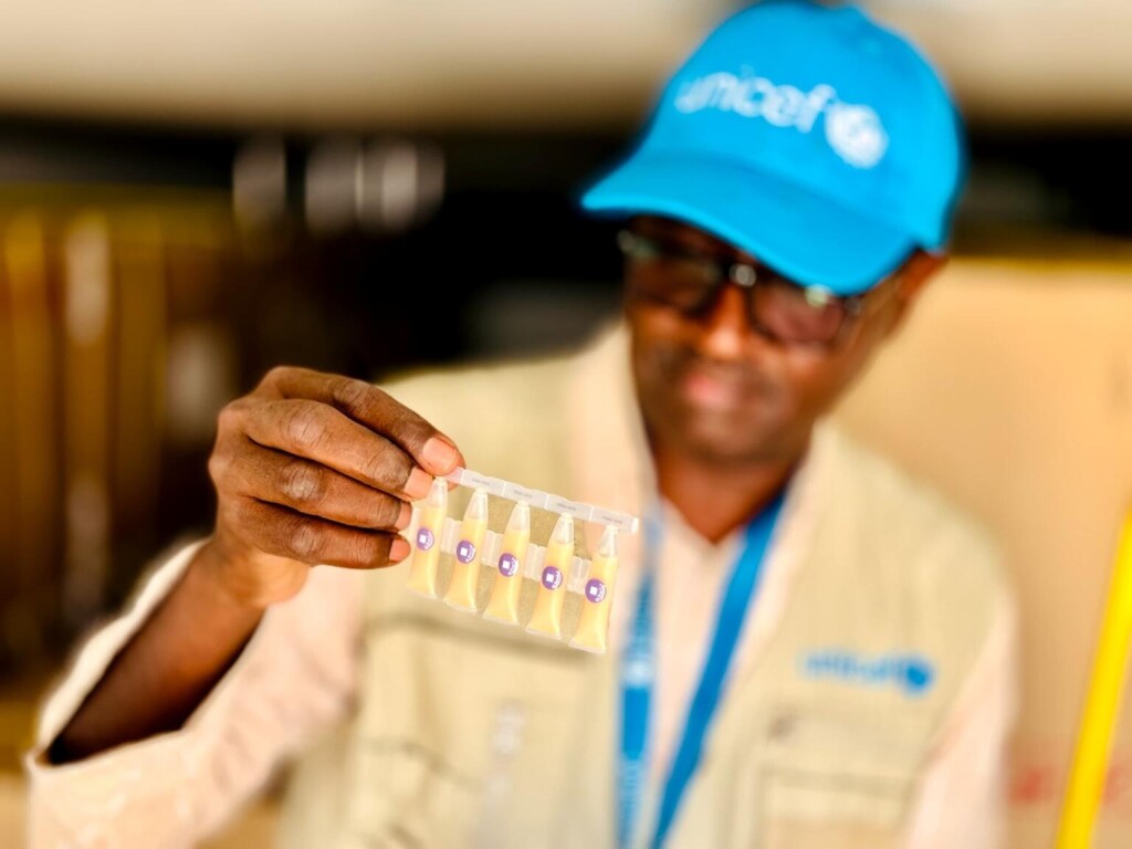 On 5 October 2024 in Port Sudan, Sudan, UNICEF Health Officer Khattab Obaid inspects a shipment of cholera vaccines in the back of a refrigerated truck before they are transported to Kassala, Gedaref and River Nile states. A UNICEF-chartered plane carrying 1.4 million doses of oral cholera vaccines arrived in Port Sudan, Sudan, early this morning, to bolster efforts to protect children from the ongoing cholera outbreak affecting the country. Since the current outbreak began in July 2024, over 18,000 cases of cholera and approximately 550 deaths have been reported in 10 states across the country. The new batch of vaccines adds to the 404,000 doses UNICEF delivered to Sudan last month and will be used in the ongoing immunization campaigns. The campaigns aim to vaccinate 1.81 million people against cholera in the hardest-hit states: Gedaref, Kassala and River Nile. Besides cholera, concurrent outbreaks of other diseases – such as dengue, malaria and measles – are taking hold in at least 12 of Sudan’s 18 states. Earlier this week, UNICEF delivered nearly 190,000 doses of malaria vaccines to the country to help protect children from malaria. “Coming on the heels of war, displacement and famine, the impact of these epidemics could be catastrophic for children,” said Sheldon Yett, UNICEF Representative to Sudan. “Delivery of the vaccines to health authorities in Sudan and into the arms of communities most at risk is essential for stopping the spread of these deadly diseases.” Ongoing disease outbreaks are pushing Sudan’s already fragile healthcare system to a breaking point and exacerbating weaknesses in the sanitation and hygiene infrastructure. Limited access to safe water and adequate sanitation, especially in overcrowded displacement sites and camps increases the risk of transmission. Children who have never been vaccinated and those suffering from malnutrition are particularly at risk. “We need all hands on deck now to scale up our response,